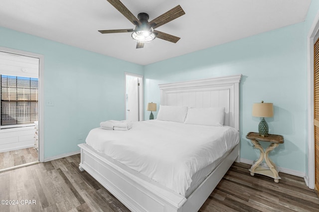 bedroom featuring dark hardwood / wood-style floors and ceiling fan