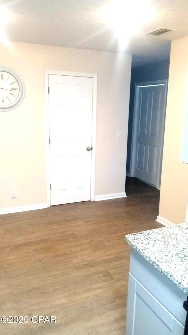 848 Helen Ave, Panama City, FL 32401 - empty room with wood finished floors and baseboards
