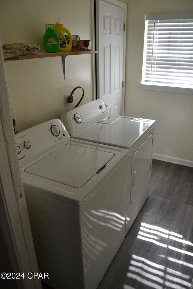 848 Helen Ave, Panama City, FL 32401 - laundry room with washer and dryer, wood finished floors, and baseboards