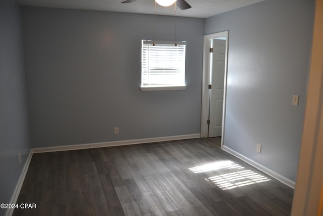 spare room with ceiling fan and hardwood / wood-style floors