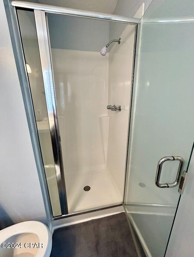 848 Helen Ave, Panama City, FL 32401 - bathroom with a shower stall and toilet