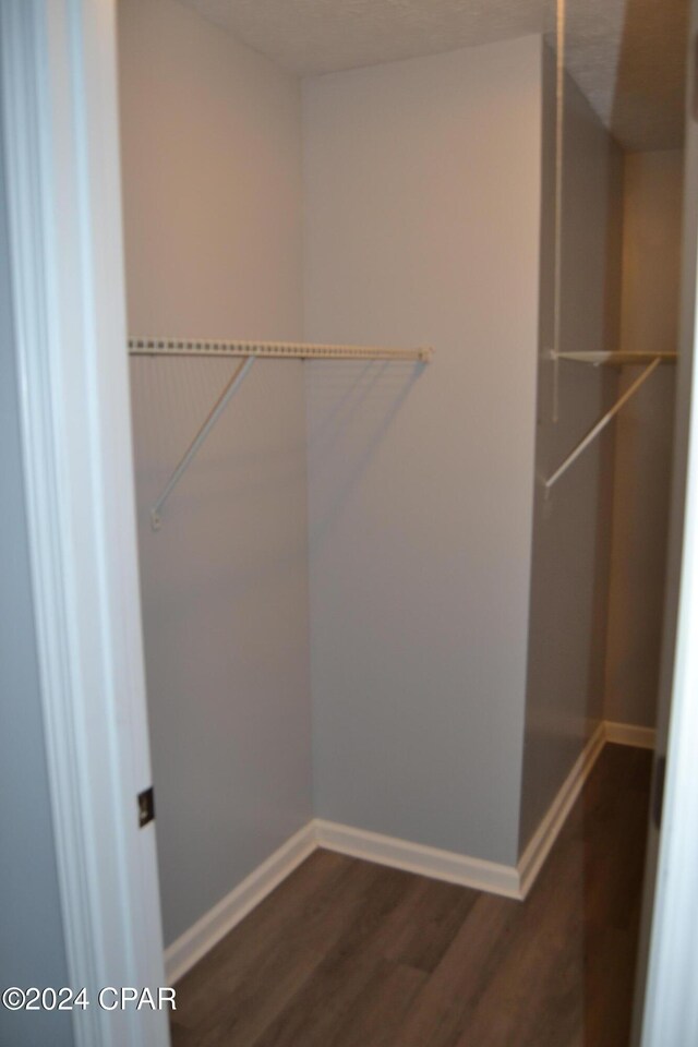 848 Helen Ave, Panama City, FL 32401 - spacious closet with dark wood-type flooring