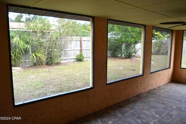 848 Helen Ave, Panama City, FL 32401 - unfurnished sunroom with stone finish flooring and plenty of natural light