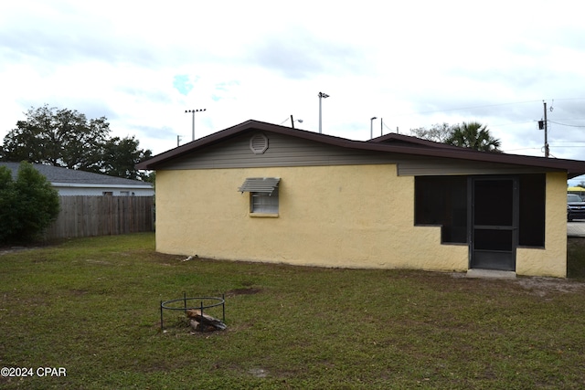 view of home's exterior featuring a lawn