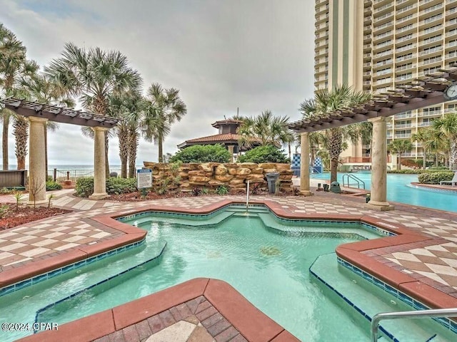 view of swimming pool with a gazebo and a patio