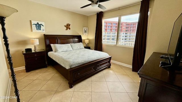 bedroom featuring ceiling fan and light tile patterned floors