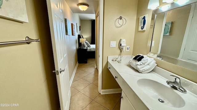 bathroom featuring tile patterned floors and vanity