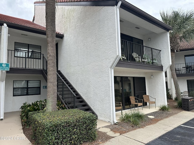 exterior space featuring a balcony