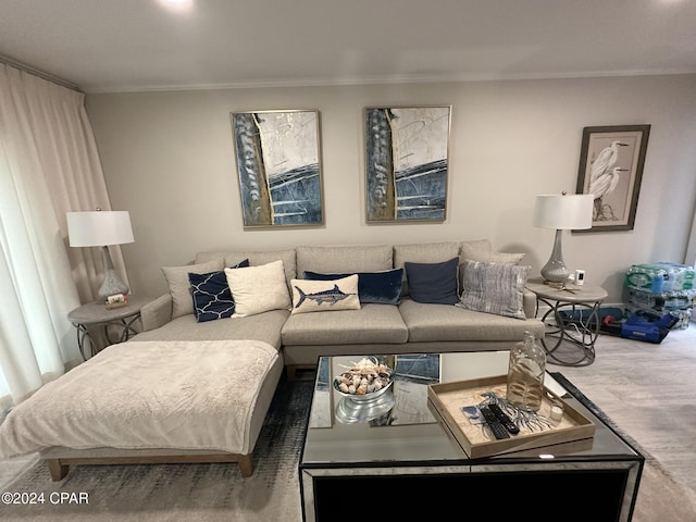 living room with hardwood / wood-style floors and crown molding