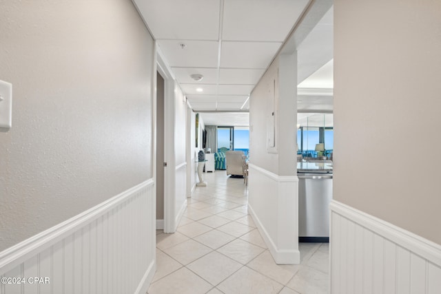 hallway featuring light tile patterned flooring