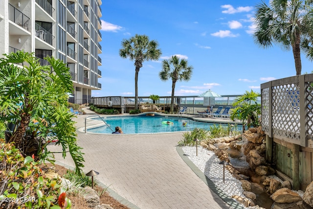 view of swimming pool featuring a patio