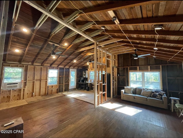 misc room with wood walls, wooden ceiling, lofted ceiling with beams, cooling unit, and wood-type flooring