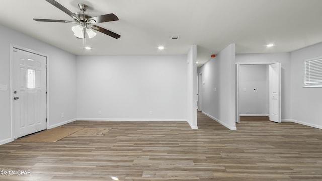 foyer featuring ceiling fan and light hardwood / wood-style flooring