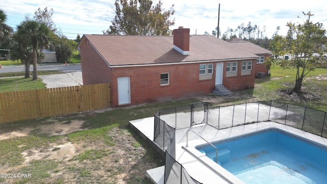 view of swimming pool with central AC