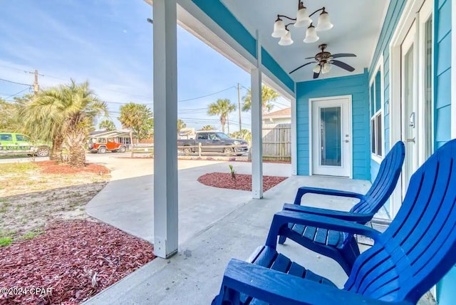 view of patio featuring ceiling fan