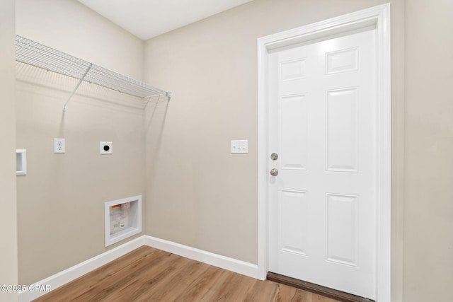 laundry room with hardwood / wood-style flooring, washer hookup, and electric dryer hookup