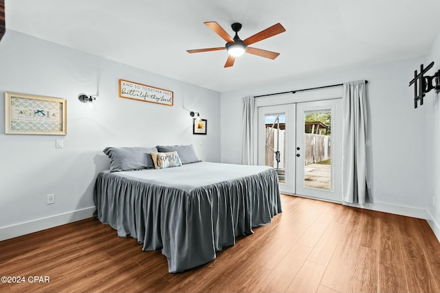 bedroom featuring ceiling fan, access to exterior, french doors, and wood-type flooring