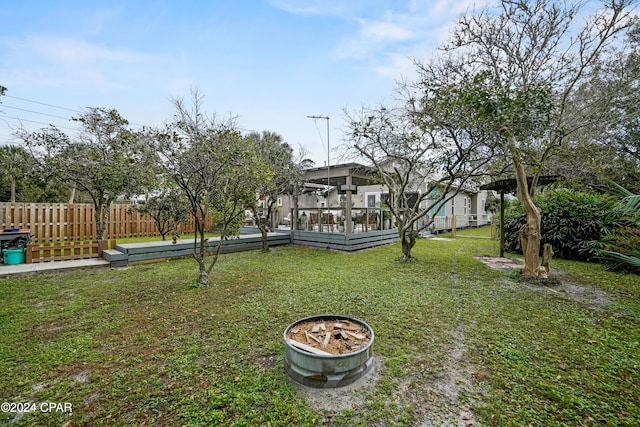 view of yard featuring a wooden deck