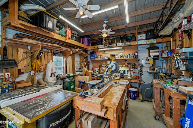 miscellaneous room featuring a workshop area and ceiling fan