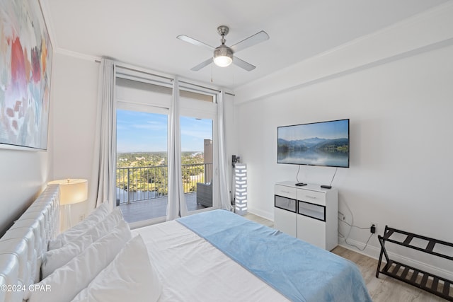 bedroom with access to exterior, light hardwood / wood-style floors, ceiling fan, and ornamental molding