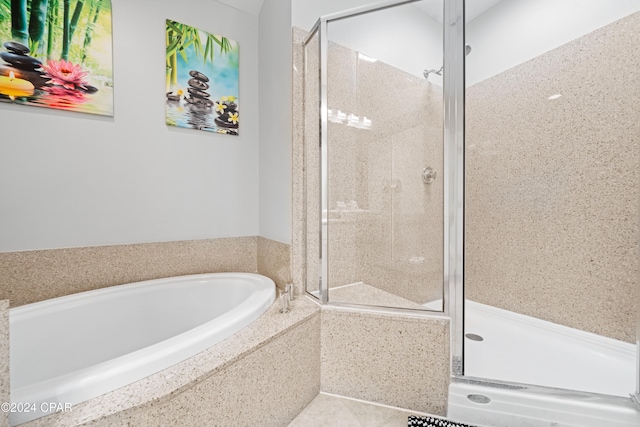 bathroom with tile patterned floors and plus walk in shower