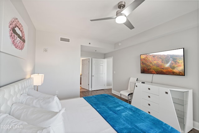 bedroom featuring hardwood / wood-style flooring and ceiling fan