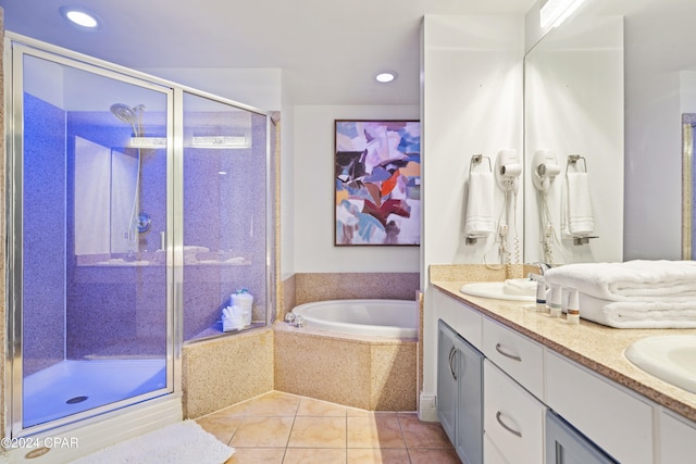 bathroom featuring tile patterned floors, separate shower and tub, and vanity