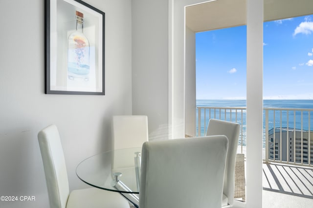 dining area with a water view