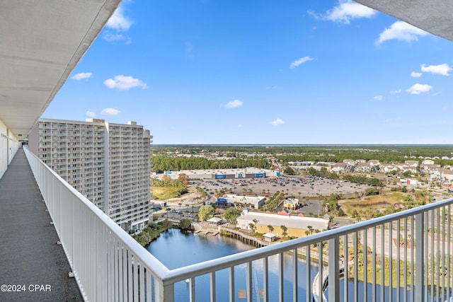 balcony featuring a water view