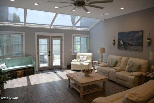 living room with ceiling fan, lofted ceiling, wood-type flooring, and french doors