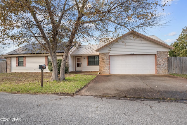 single story home with a garage