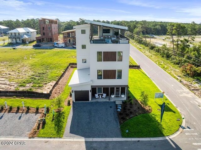 view of front of home with a balcony