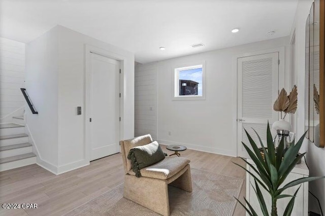 sitting room with light wood-type flooring