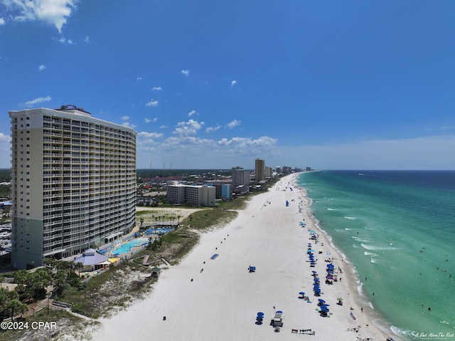 aerial view featuring a view of the beach and a water view