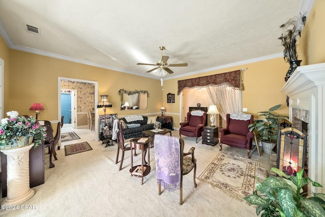 carpeted living room with ceiling fan, ornamental molding, a textured ceiling, and a brick fireplace