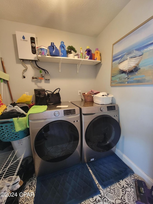 laundry room with washing machine and clothes dryer