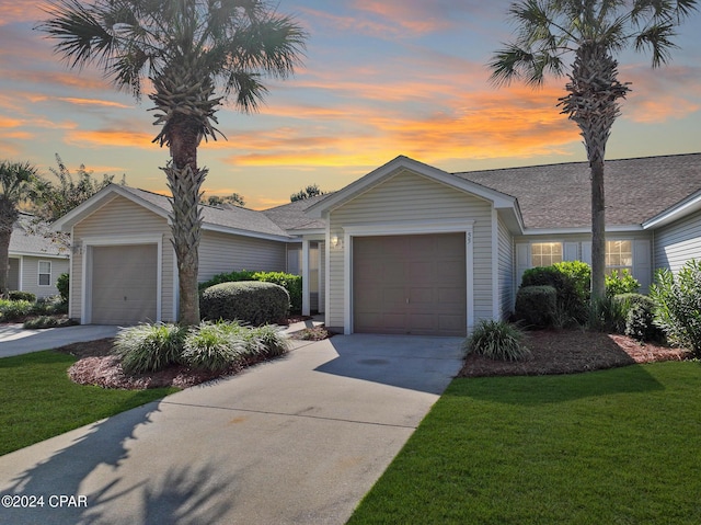 single story home featuring a yard