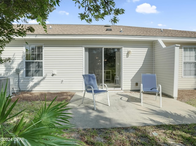 rear view of property with a patio area