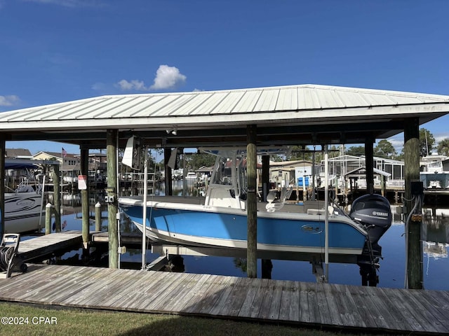 dock area with a water view