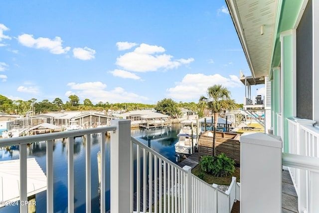 balcony featuring a water view