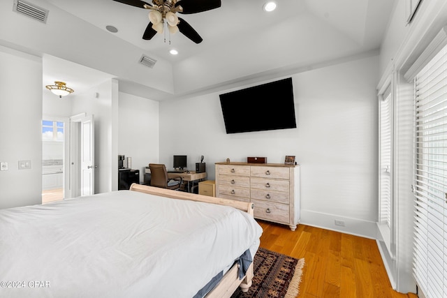 bedroom with ceiling fan and light hardwood / wood-style floors