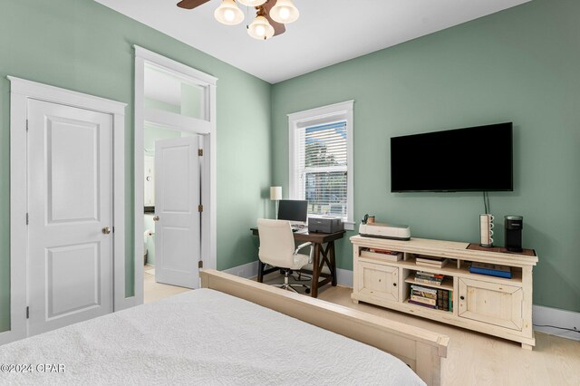 bedroom featuring hardwood / wood-style flooring