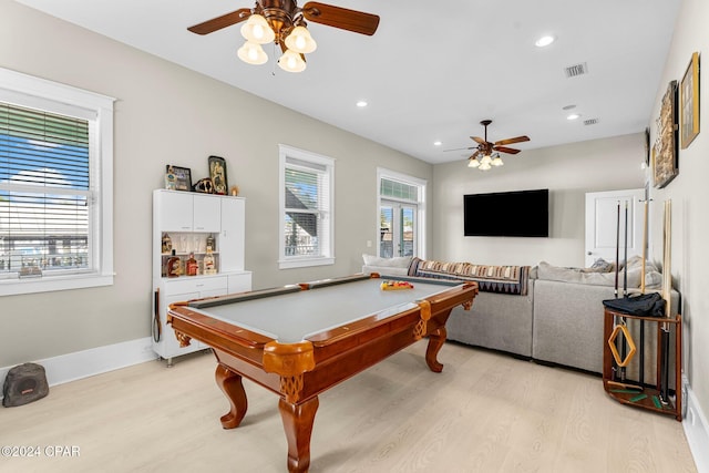 game room featuring ceiling fan, light hardwood / wood-style flooring, a wealth of natural light, and pool table