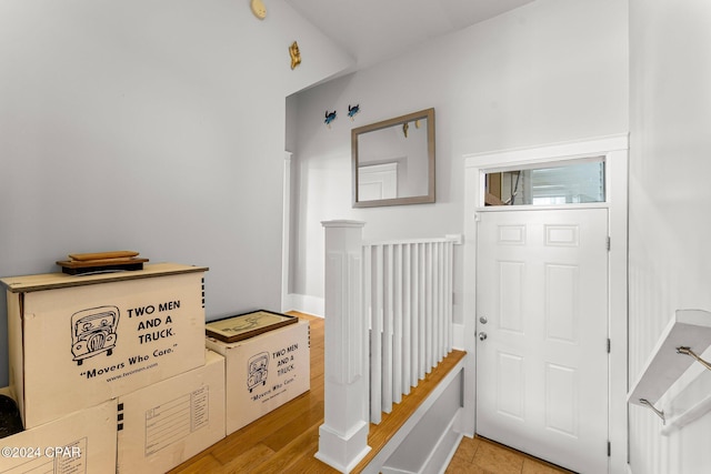 foyer entrance with light wood-type flooring