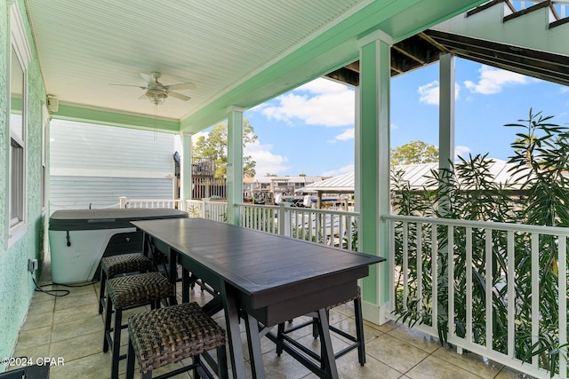 exterior space with ceiling fan