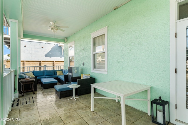 view of patio featuring outdoor lounge area and ceiling fan