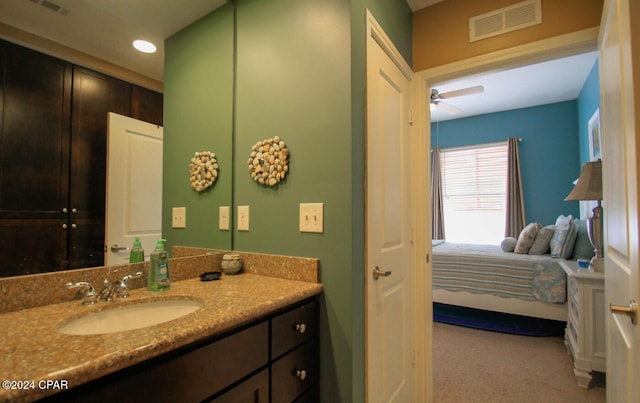 bathroom with vanity and ceiling fan