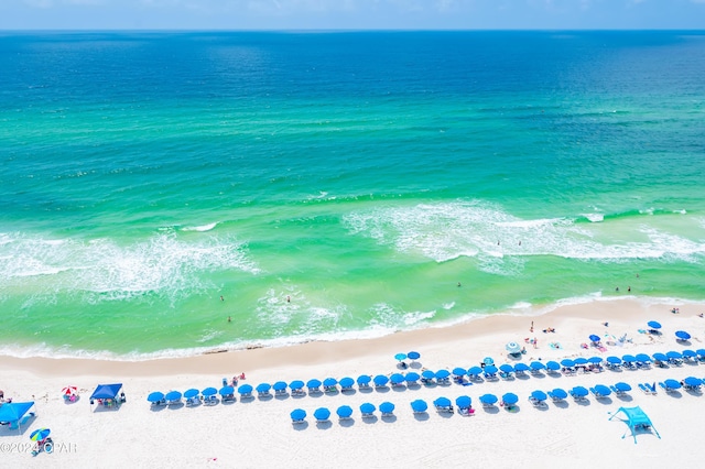 aerial view featuring a water view and a view of the beach