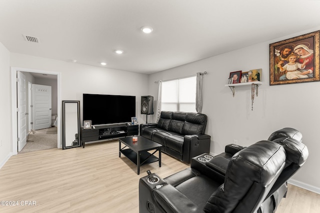 living room with light hardwood / wood-style floors