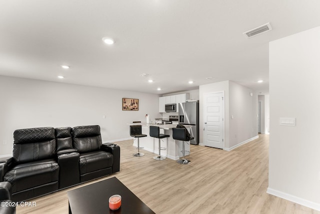 living room featuring light wood-type flooring